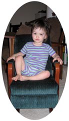 A picture of Tamiko sitting in a rocking chair.